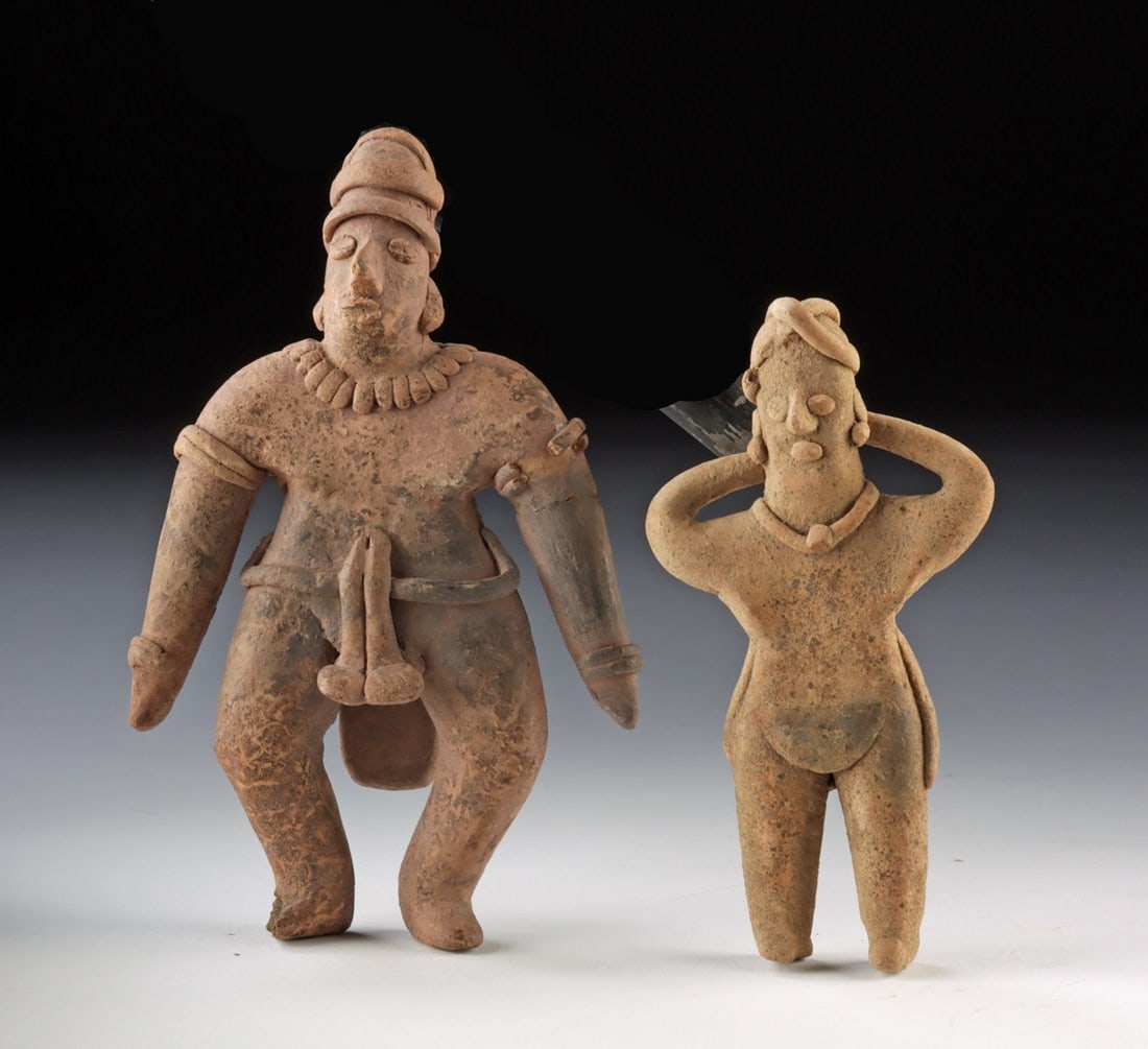 Two Colima Pottery Standing Figures Wearing Loincloths: Pre-Columbian, West Mexico, Colima culture, ca. 300 BCE to 300 CE. A lively pair of Colima pottery standing figures modeled with strong limbs and expressive features, each wearing a simple loincloth t