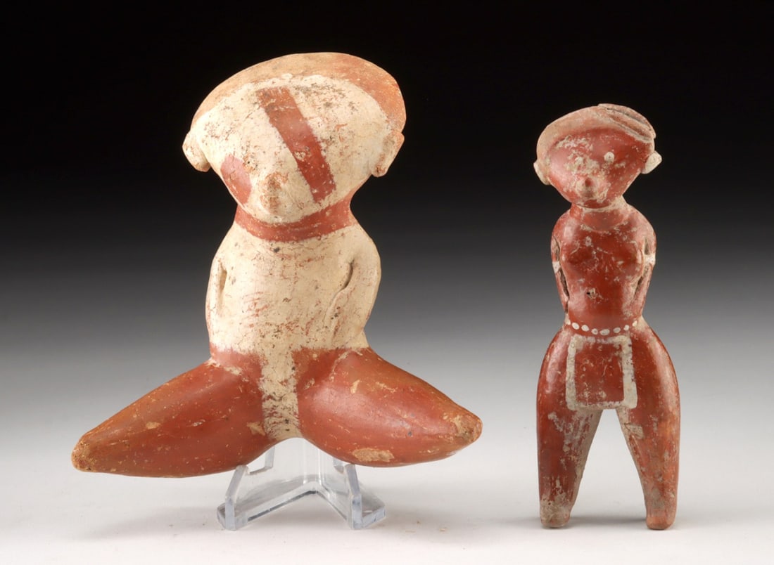 Pair of Chinesco Pottery Figures, Nayarit: Pre-Columbian, West Mexico, Nayarit, Chinesco tradition, ca. 200 BCE to 300 CE. A pair of pottery figures rendered in earthen clay with cream and red slip decoration. The seated figure is shown with l