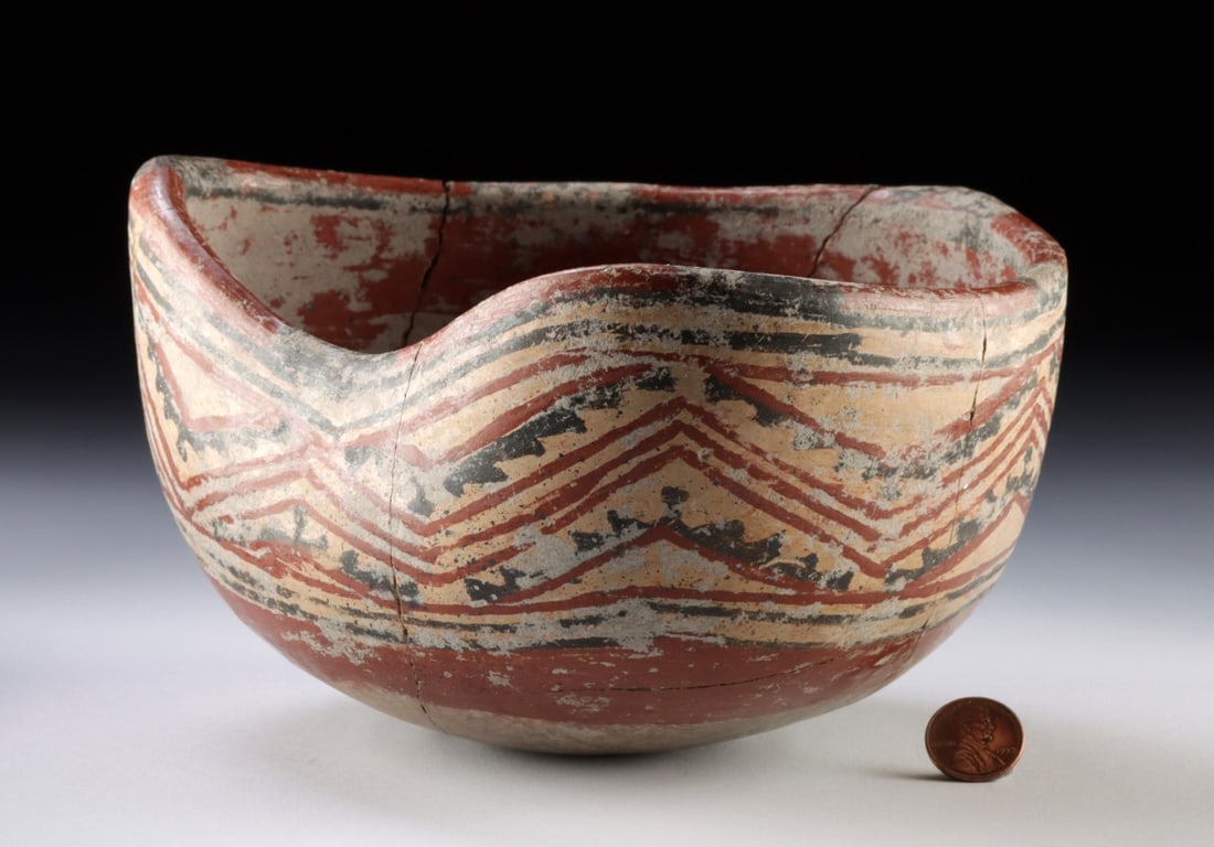 Chupícuaro Polychrome Bowl, Lobed Heart-Shaped Mouth: Pre-Columbian, Mexico, Chupicuaro, ca. 500–100 BCE. A polychrome earthenware bowl with a lobed, heart-shaped mouth formed by a pinched dip at each side of the rim. The exterior is painted in red