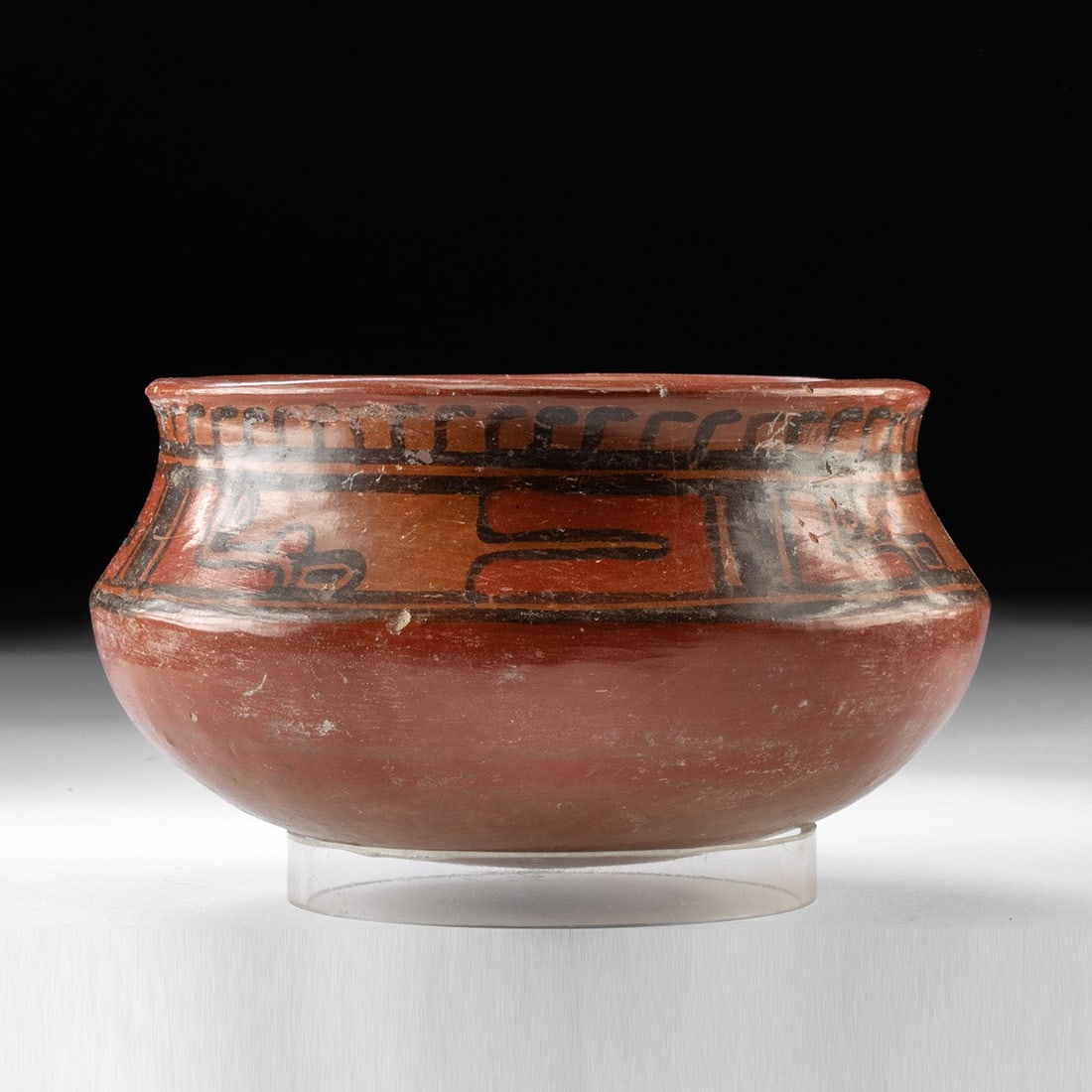 Maya Copador Polychrome Bowl - Pseudoglyph Frieze: Pre-Columbian, Central America, Maya, ca. 600–900 CE. A round-bodied earthenware bowl in the Copador tradition, its incurving walls washed in warm iron-red slip and girded by a horizontal regist