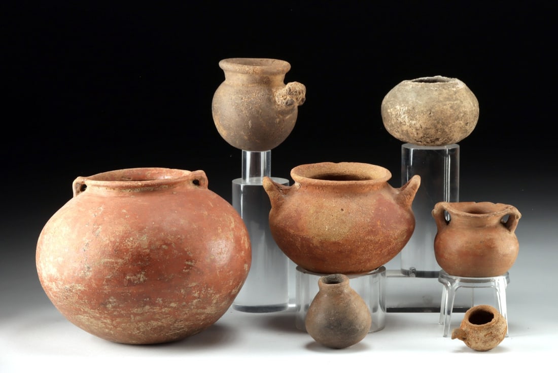 Seven Costa Rican Pottery Jars: Pre-Columbian, Central America, Costa Rica, ca. 500 to 1500 CE. A lively and varied group of seven pottery vessels, their rounded forms and earthy tones reflecting the enduring ceramic traditions of a
