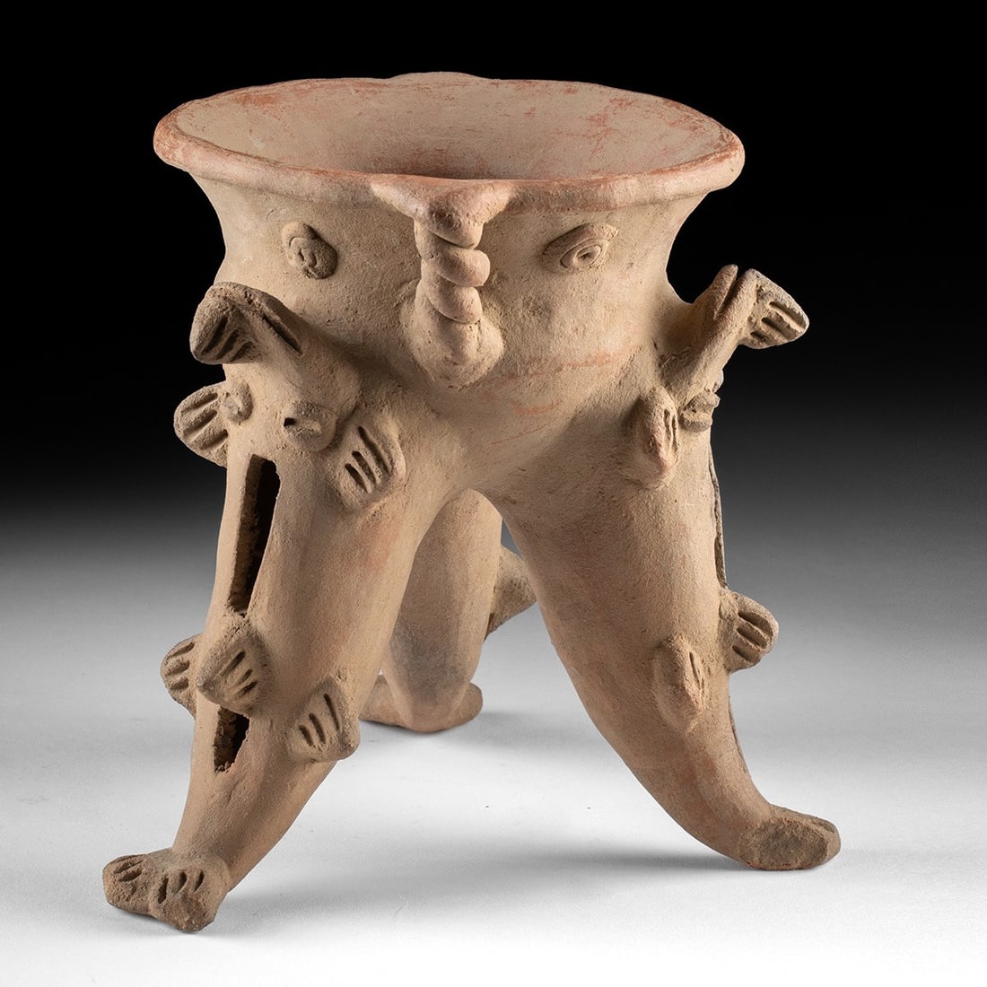 Pre-Columbian Gran Chiriqui Tripod Rattle Vessel with Shark Legs: Pre-Columbian, Panama / Costa Rica, Gran Chiriqui culture, ca. 1000 to 1500 CE. A hand-built tripod rattle vessel with a widely flared bowl rim resting on three hollow legs modeled as shark or catfish