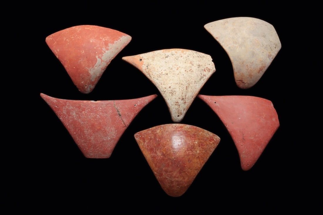 Marajo Tangas (6): Marajo Island, Para, Brazil, ca. 700–1200 CE. Six ceramic pubic covers of the female natives of the Island of Marajo at the mouth of the Amazon. These triangular avian form was suspended by fibe