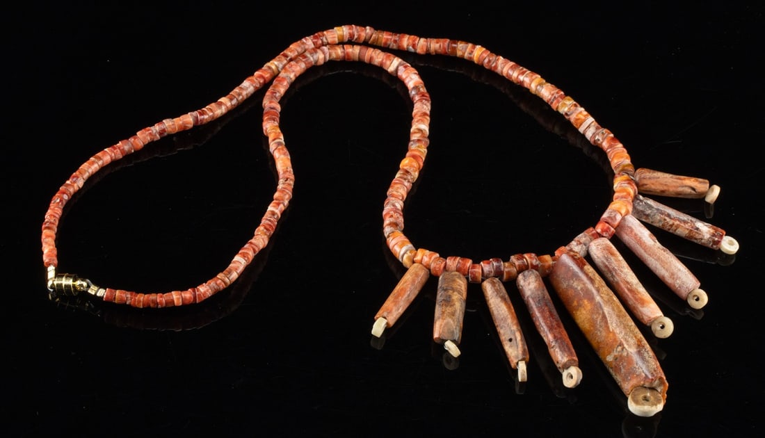 Wearable Chimu-Incan Spondylus Shell Necklace: Pre-Columbian, Chimu-Inca, ca. 1000 to 1470 CE. This necklace is composed of ancient Spondylus shell beads, valued in the Andes for their vibrant color and ceremonial associations. Strung in modern ti