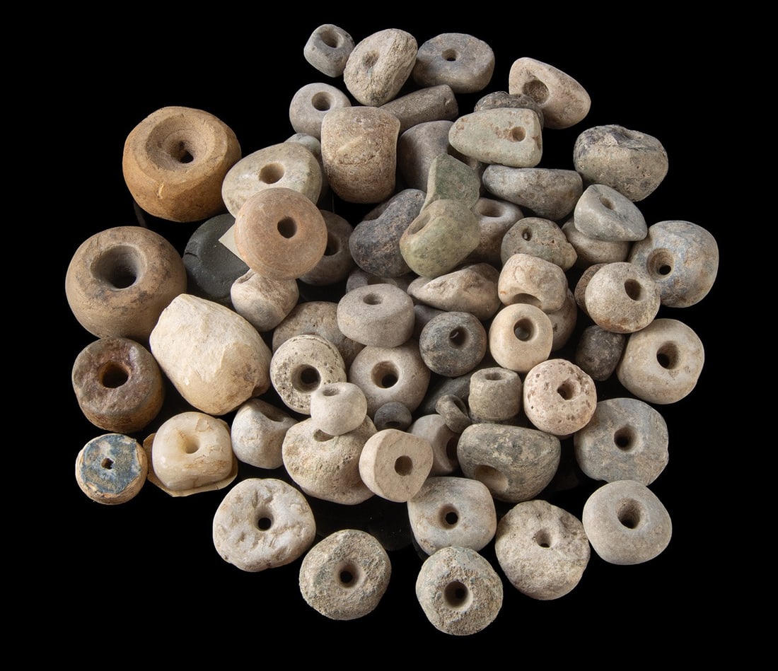 67 Native American & Pre-Columbian Beads & 1 Discodial: Native American, Southeastern United States, Mississippian culture, ca. 1000 to 1500 CE; Woodland to Mississippian periods, ca. 1000 BCE to 1500 CE; Pre-Columbian Mexico, various cultures. A group of 