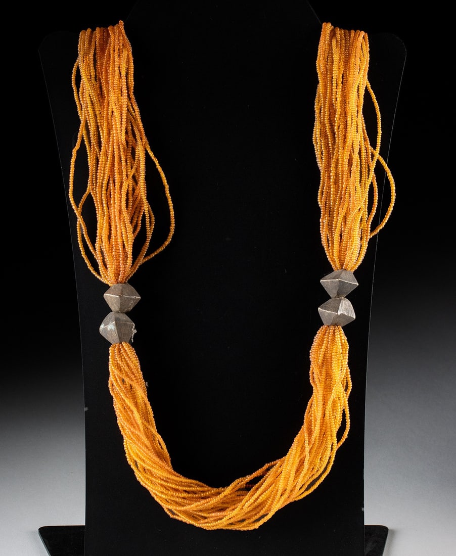 India Bonda Tribal Glass & Brass Beaded Necklace: South Asia, Eastern India, Odisha State, Bonda/Khond people, ca. mid-20th century CE. This necklace features multiple strands of cotton or silk, strung with hundreds of orange glass seed beads,