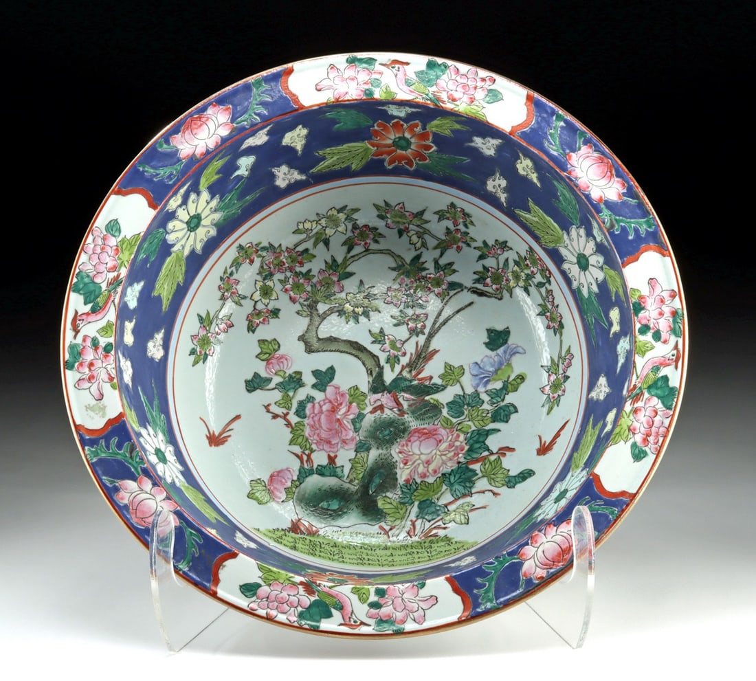 Qing Famille Rose Porcelain Basin, Tongzhi Mark: East Asia, China, Qing Dynasty, ca. late 19th century CE. A large porcelain basin lavishly decorated in famille rose enamels, featuring low-relief textural grounds enlivened with flowering branches, s