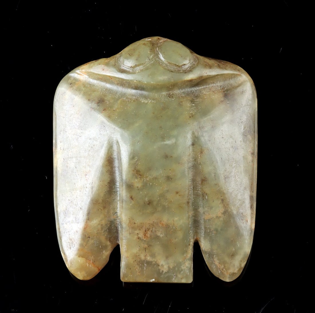 Chinese Hongshan Style Nephrite Jade Bird Pendant: East Asia, China, ca. mid-20th century CE. A carved nephrite jade bird form inspired by celebrated Hongshan culture avian carvings, rendered with a compact, stylized body and softly modeled wings. The