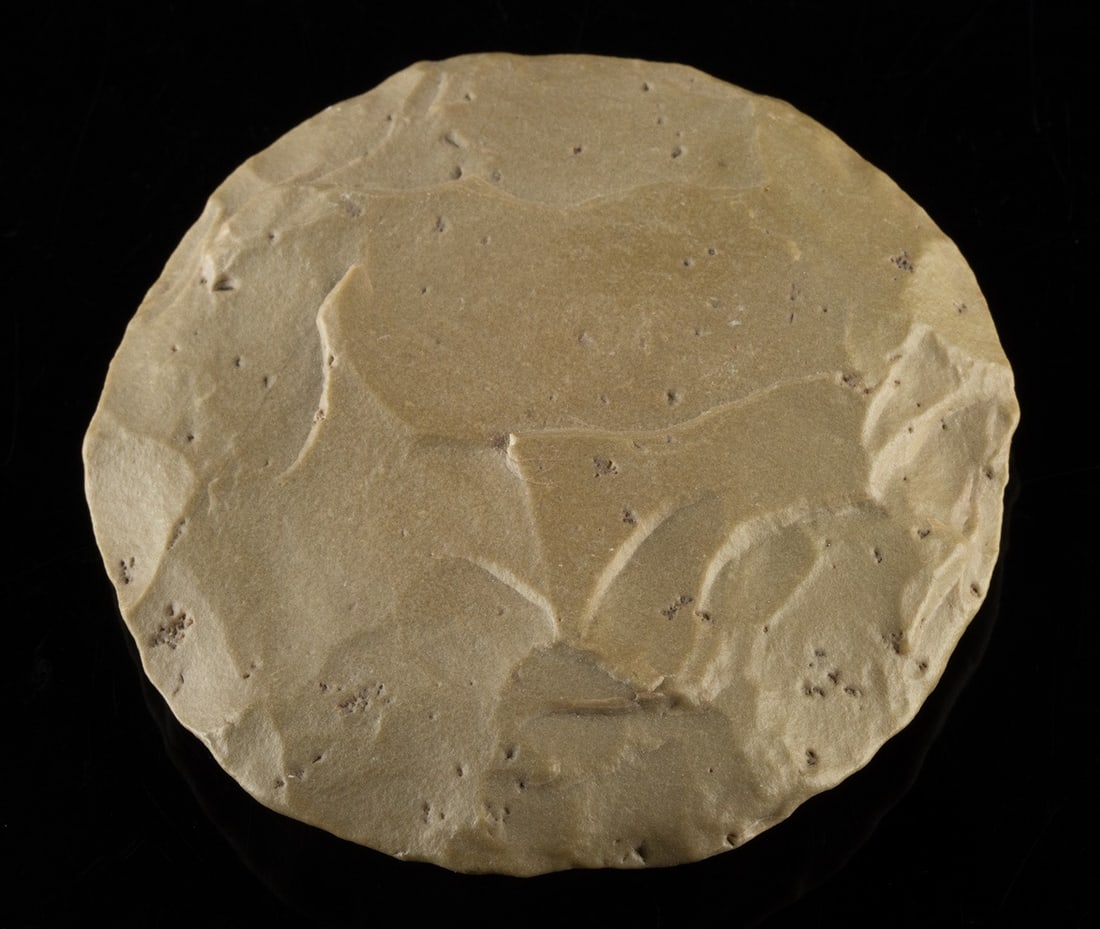 Neolithic North African Circular Flint Blade Tool: North Africa, Sahara Desert region, Neolithic Period, ca. 8000 to 3000 BCE. A circular chert tool formed as a broad discoidal blade with carefully flaked edges creating a continuous cutting surface. T