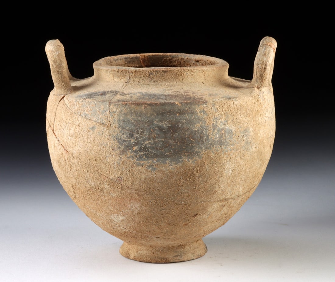 Greek Terracotta Lebes Gamikos - Running Spirals: Aegean, Greece,, ca. 1375–400 BCE. A rounded, ovoid body rises from a small ring foot to a short flaring neck, flanked by two upright loop handles set at the shoulder. The buff fabric carries lu