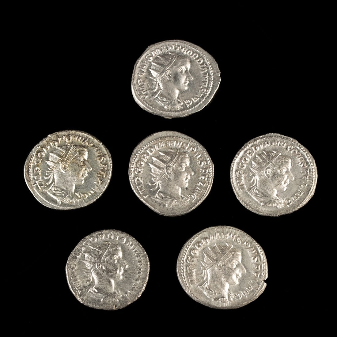 3rd C. Roman Silver - Gordian III Group of Six: Roman, Imperial period, ca. 238–244 CE. Six Roman silver antoniniani of Gordian III (r. 238-244 CE), each struck on a slightly irregular flan with a radiate, draped, and cuirassed imperial bust 