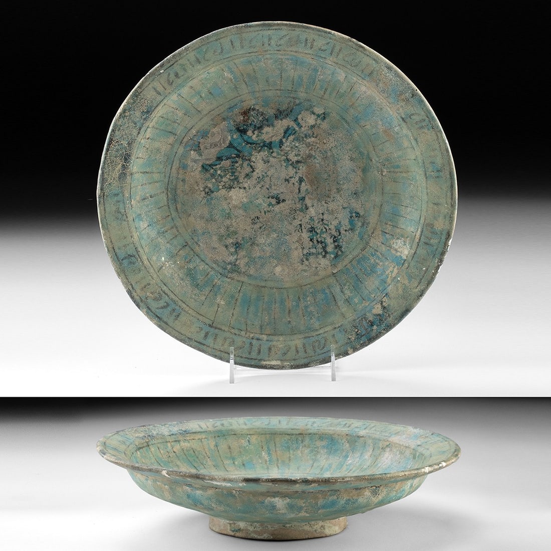 10th-12th C. Nishapur Turquoise Glazed Earthenware Dish: Central Asia, Persia, Nishapur, ca. 900–1200 CE. A broad earthenware dish coated in a turquoise alkaline glaze, its wide flaring rim encircling a shallow, gently sloping well. The interior carri