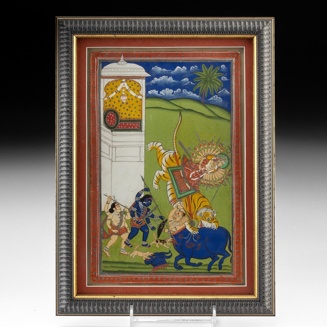 19th C. Pahari Gouache Painting - Durga Slaying the Buffalo Demon Mahishasura: South Asia, India, Pahari school (Himalayan foothills), ca. 1800–1899 CE. A jewel-toned battlefield unfolds across this gouache-on-paper miniature, where the mother goddess Durga rides her tawny