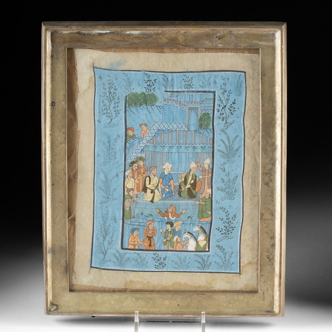 Indo-Persian Silk Miniature - Court Scene: South Asia, Indo-Persian tradition, ca. 20th century CE. A luminous durbar unfolds across cerulean silk: a robed dignitary seated at center receives the attentions of turbaned courtiers while attendan