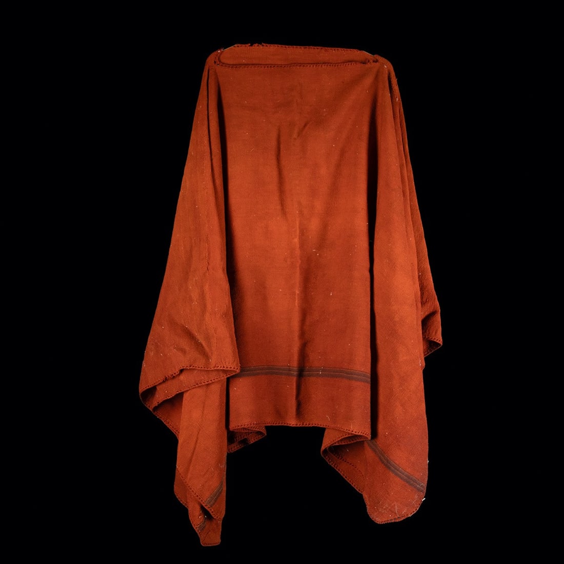 Andean Wool Poncho - Red-Orange Quechua or Aymara Textile: South America, Peru / Bolivia, Quechua or Aymara culture, ca. mid to late 20th century CE. A large handwoven poncho of sheep's wool, dyed a red-orange and worked in a dense, even plainweave. Two separ