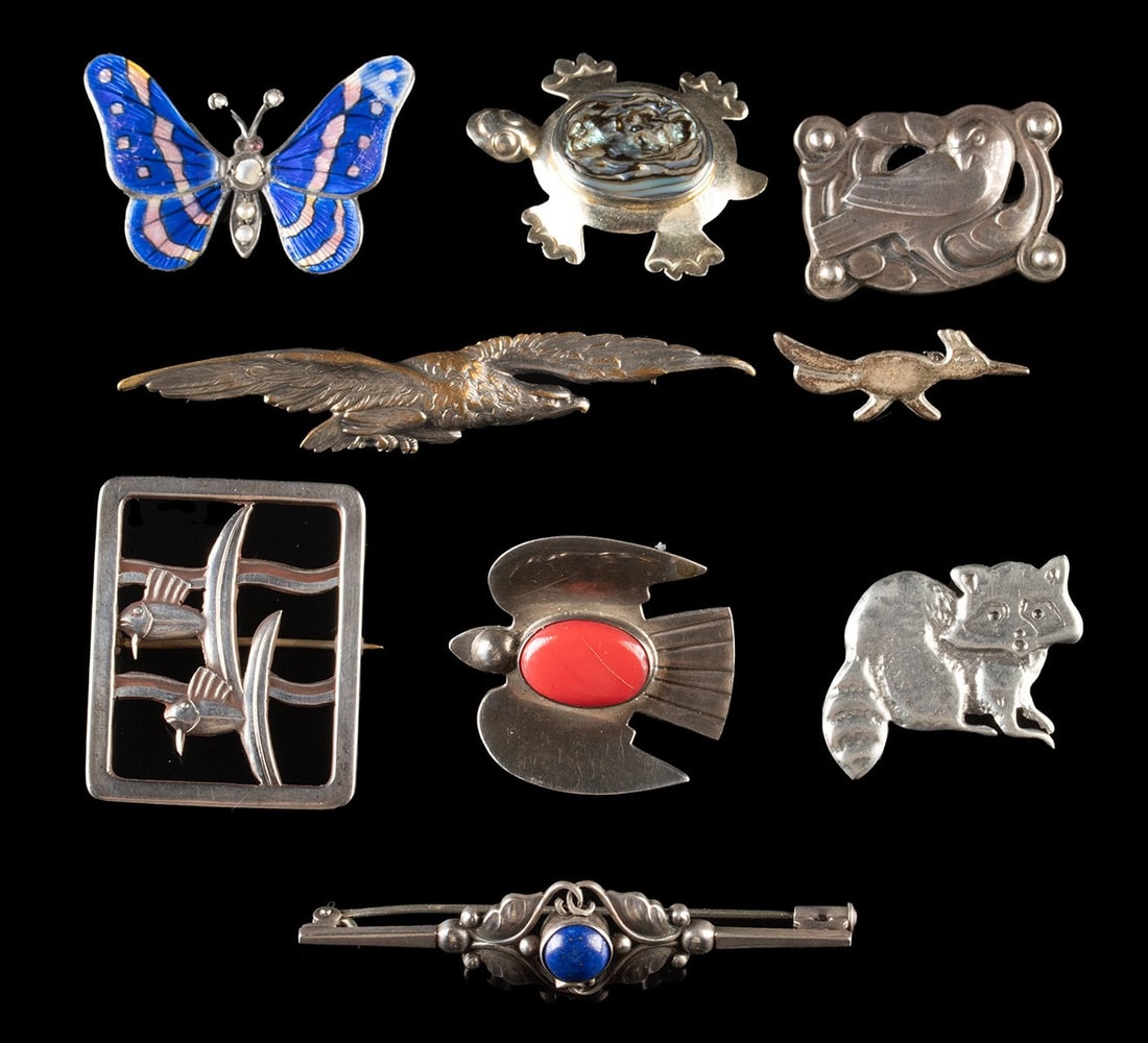 USA, Danish, Mexican Sterling Silver Brooches, 9 pcs: United States, Mexico & Denmark: mid-20th century CE. A charming nine-piece assortment of vintage silver and brass brooches and pins centered on lively animal and nature motifs. Included are an unmark