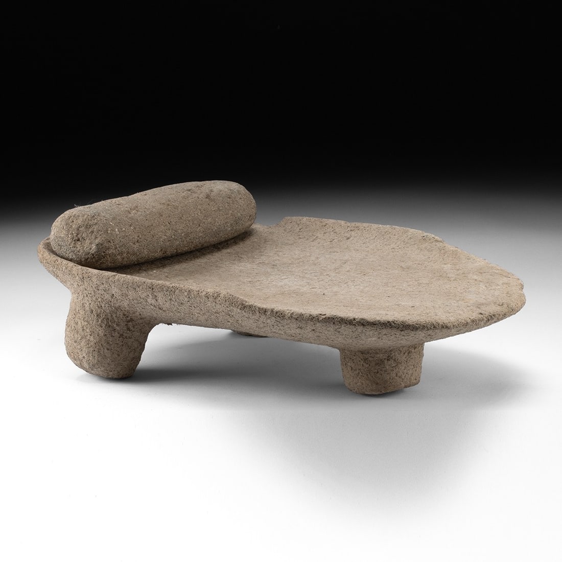 Costa Rica Stone Metate & Mano - Corn Grinder: Pre-Columbian, Central America, Costa Rica, ca. 300–1500 CE. A robust grinding set carved from dense volcanic stone, comprising an ovoid metate and its companion mano. The metate presents a broa
