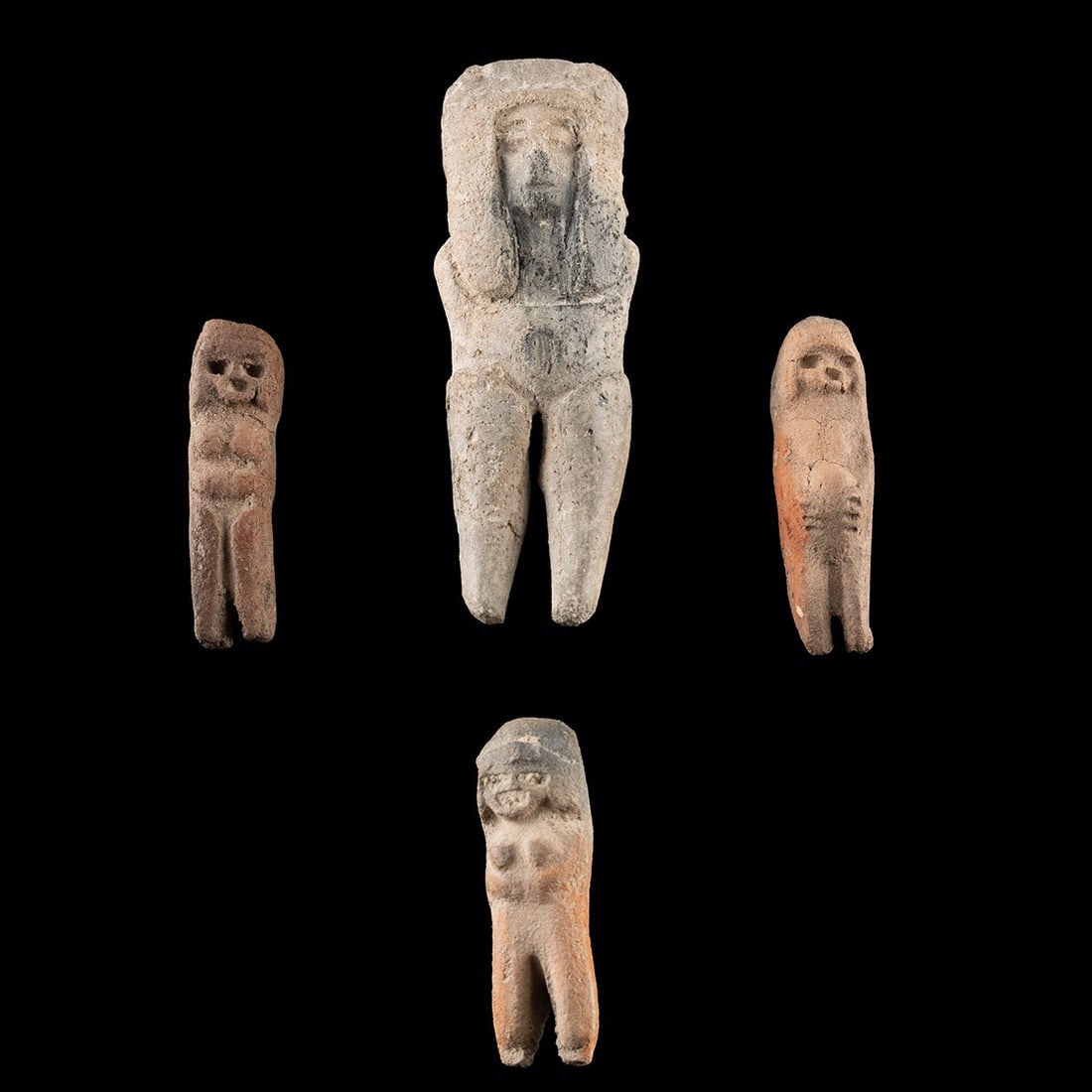 Pre-Columbian Valdivia Pottery Figures - Four Miniature Anthropomorphic Amulets: Pre-Columbian, Ecuador, Valdivia, ca. 3500–1800 BCE. A group of four Pre-Columbian pottery figures from one of the earliest figurative traditions in the Americas. Each is modeled as a standing f