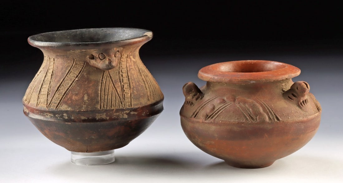 Two Incised Pre-Columbian Pottery Jars w/ Zoomorph Lugs: Pre-Columbian, Costa Rica to Ecuador, ca. 500 to 1500 CE. A pair of hand-built redware ceramic vessels, each decorated with incised geometric motifs -including hatched triangular and diagonal line pat