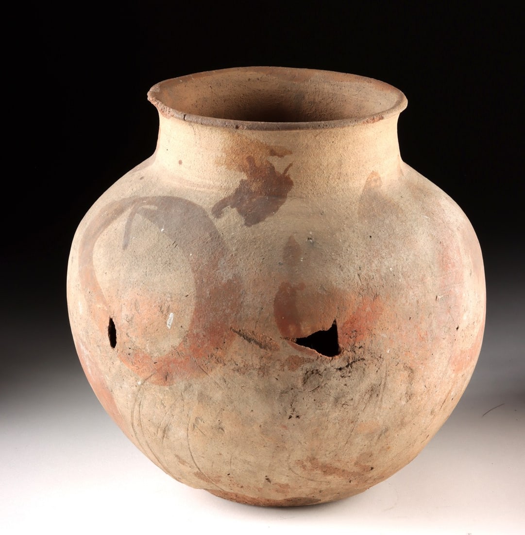19th C. Native American Pueblo Pottery Storage Jar: Native American, Southwestern United States, Tewa / Puebloan culture, ca. 19th century CE. A globular earthenware vessel with a broad, gently flaring rim and rounded body, shaped by hand and finished 