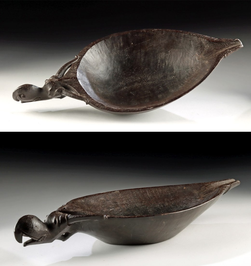 Dayak Ironwood Bowl w/ Hornbill Shaped Handle: Southeast Asia, Indonesia, Borneo, Dayak peoples, ca. early to mid-20th century CE. Carved from dense ironwood, this elongated leaf-shaped bowl has sharply tapering ends, one narrowing to a pointed sp