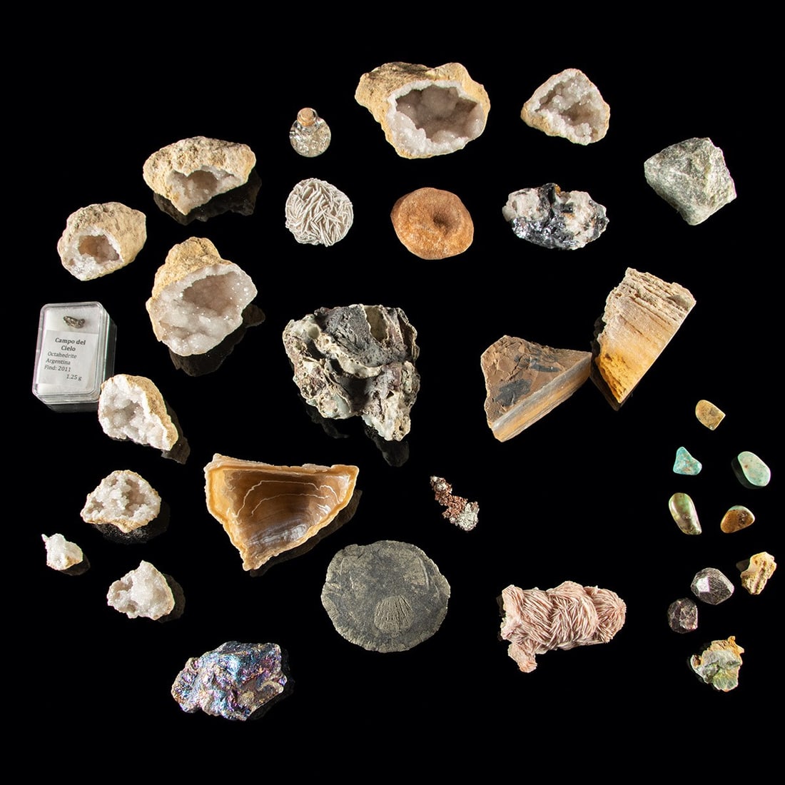 Mixed Mineral, Fossil & Meteorite Collection - Geodes, Fluorite, Campo del Cielo: North America, South America, & Africa, ca. millions of years ago. A collection of mineral specimens, fossils, and a meteorite fragment. The lot includes several quartz crystal geodes, a desert rose s