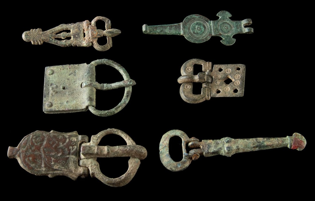 6 Byzantine and Medieval Belt Buckles: Europe, late Romano-British to late Medieval period, ca. 4th to 15th century CE. A group of six bronze and copper-alloy belt buckles spanning the late Roman, Byzantine, and Medieval periods, illustrat