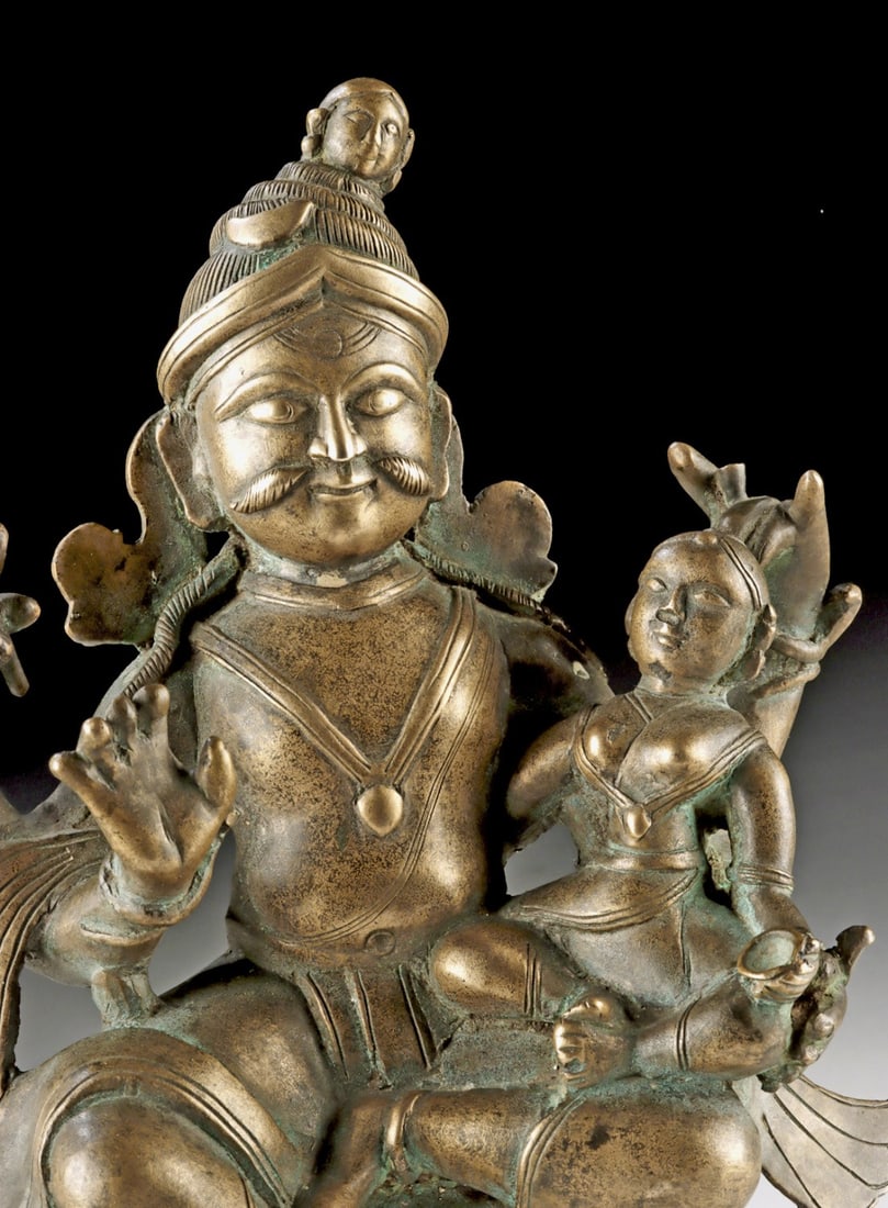 18th C. Indian Bronze - Shiva w/ Parvati Holding Bowl: South Asia, India, ca. 18th to 19th century CE. A finely cast bronze sculpture depicting the divine couple Shiva and Parvati, an enduring symbol of cosmic unity and balance in Hindu art. Shiva, portra