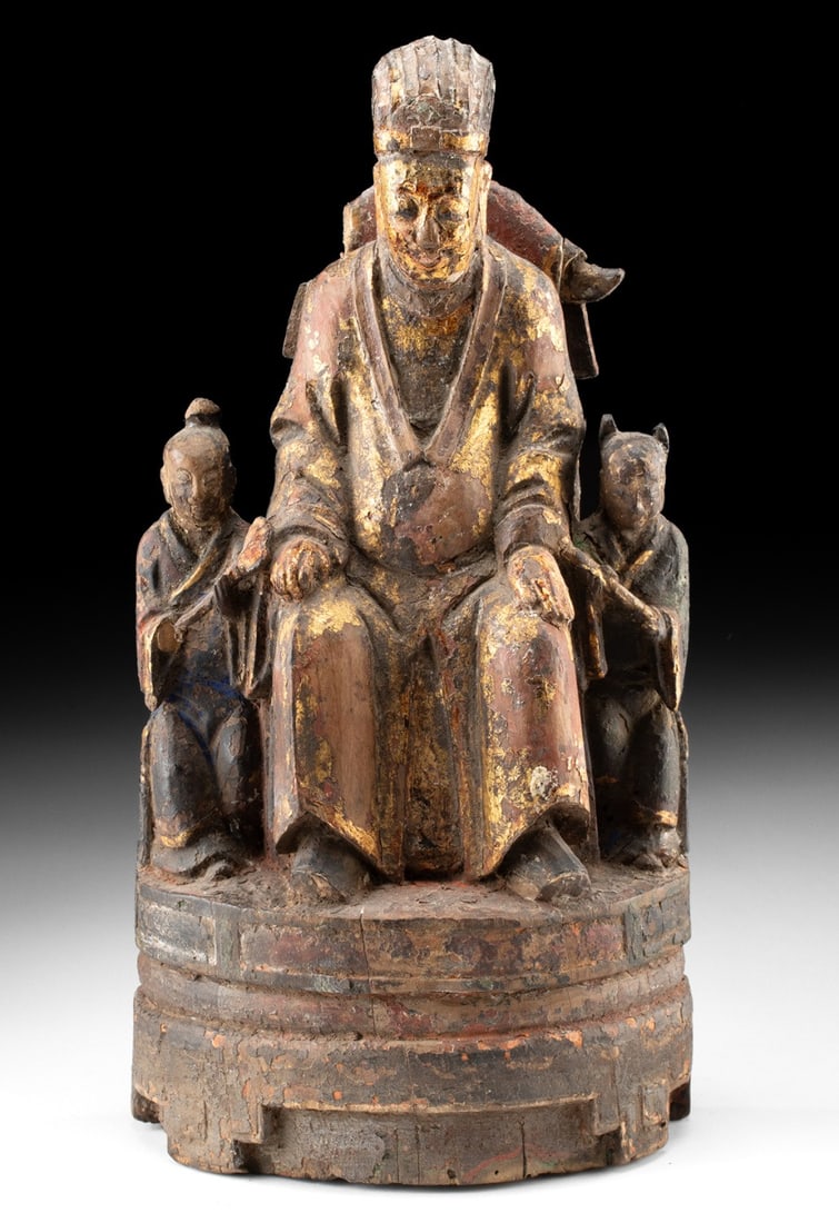 18th C. Chinese Giltwood Carving | Enthroned Deity & Acolytes: East Asia, China, Qing Dynasty, ca. 18th century. A giltwood carving depicting a seated deity or high-ranking figure, enthroned and flanked by a pair of attendants in postures of respectful service, e