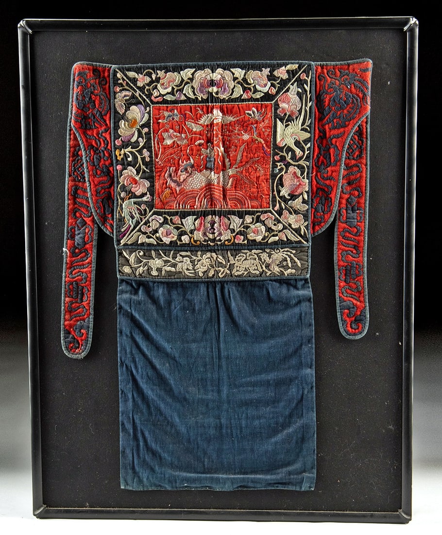 Framed Chinese Miao Embroidered Silk Baby Carrier Sling: East Asia, China, late Qing to Republic period, Miao culture, ca. late 19th to mid-20th century CE. A textile baby carrier back sling, ornamented with silk embroidery on cotton and silk panels. The lo