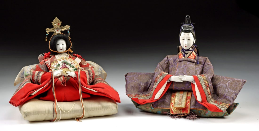 Japanese Meiji Era Silk Hina Dolls, Emperor & Empress: East Asia, Japan, Meiji era, ca. late 19th to early 20th century CE. A pair of Hina dolls traditionally displayed during Japan's Hinamatsuri festival. The figures are made of wood and covered in silk 