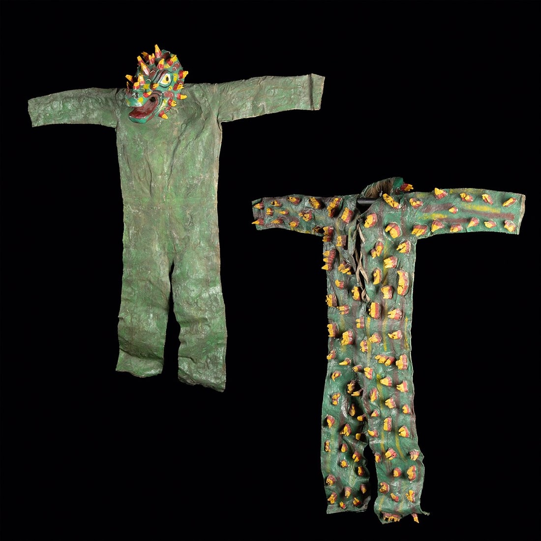 Mexican Full Dance Costume - Carved Wood Caiman Mask & Spiked Canvas Suit: Mexico, Nahua, ca. mid to late 20th century CE. A full-body costume featuring a carved and painted wooden mask and a green painted canvas suit with carved wooden spikes attached across the back, torso