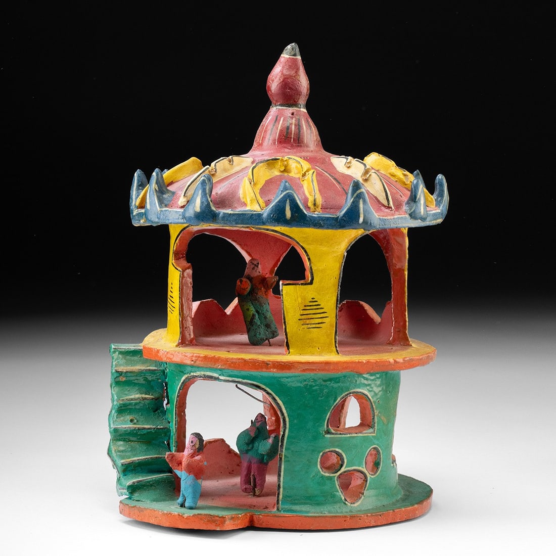 Mexican Folk Art Vibrant Ceramic Bandstand - Attributed to Candelario Medrano: Mexico, Jalisco, Santa Cruz de las Huertas, ca. mid-20th century CE. A two-story hand-modeled polychrome ceramic tableau of a bandstand or dance hall, the kiosco of the type found on Mexican town plaz