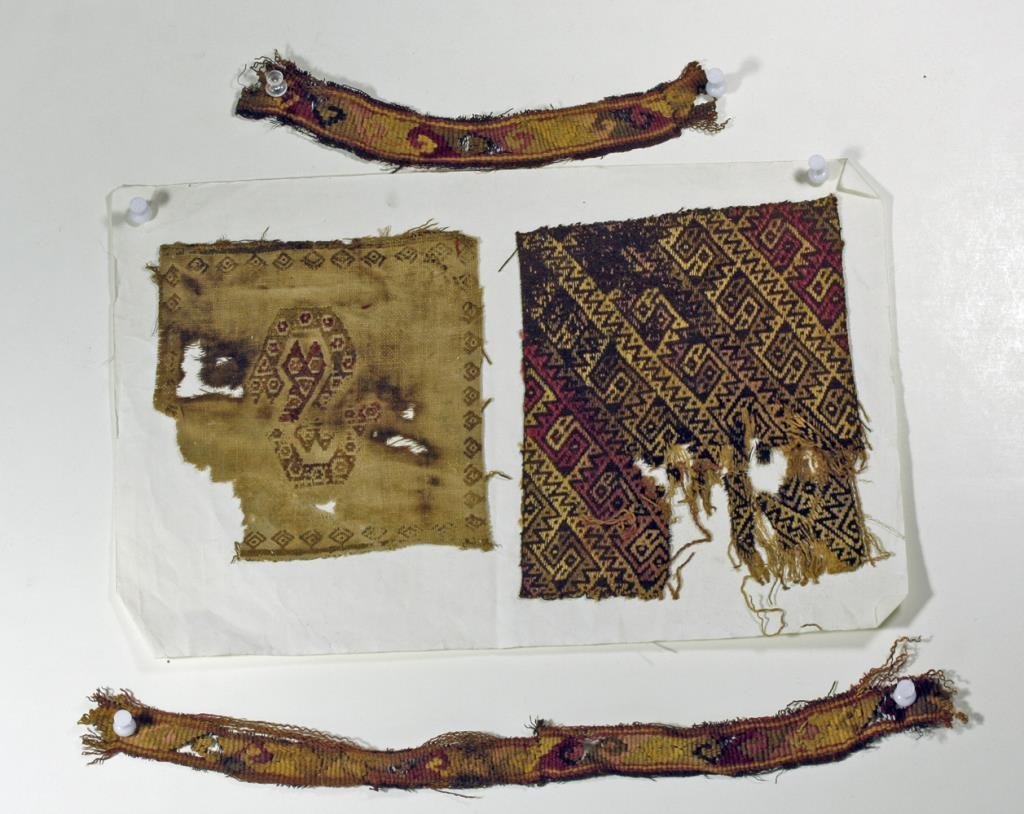 (4) Pre-Columbian Chimu / Chancay Textiles: Starts at $50 North coast, Peru, Ca 1000 to 1450 CE. Set of four ancient textiles, each from the Chimu/Chancay cultures. First, two nearly square panels one in tan with patterned edges and central pat
