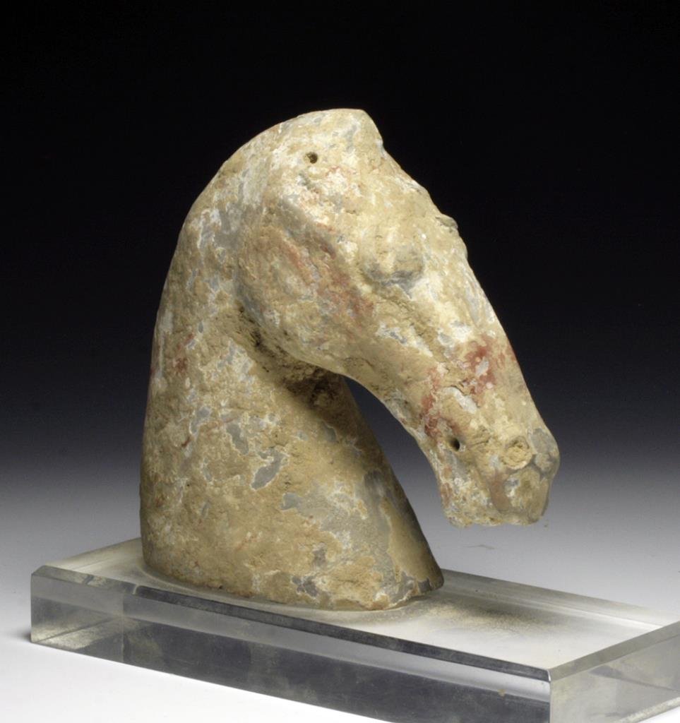 Chinese Han Dynasty Tomb Horse Head: Starts at $50 China, 206 BCE - 220 CE. A head off a full-figure horse, painted with red and white over gray pottery. Small holes in top of head where either wooden or horse-hair ears would have been a