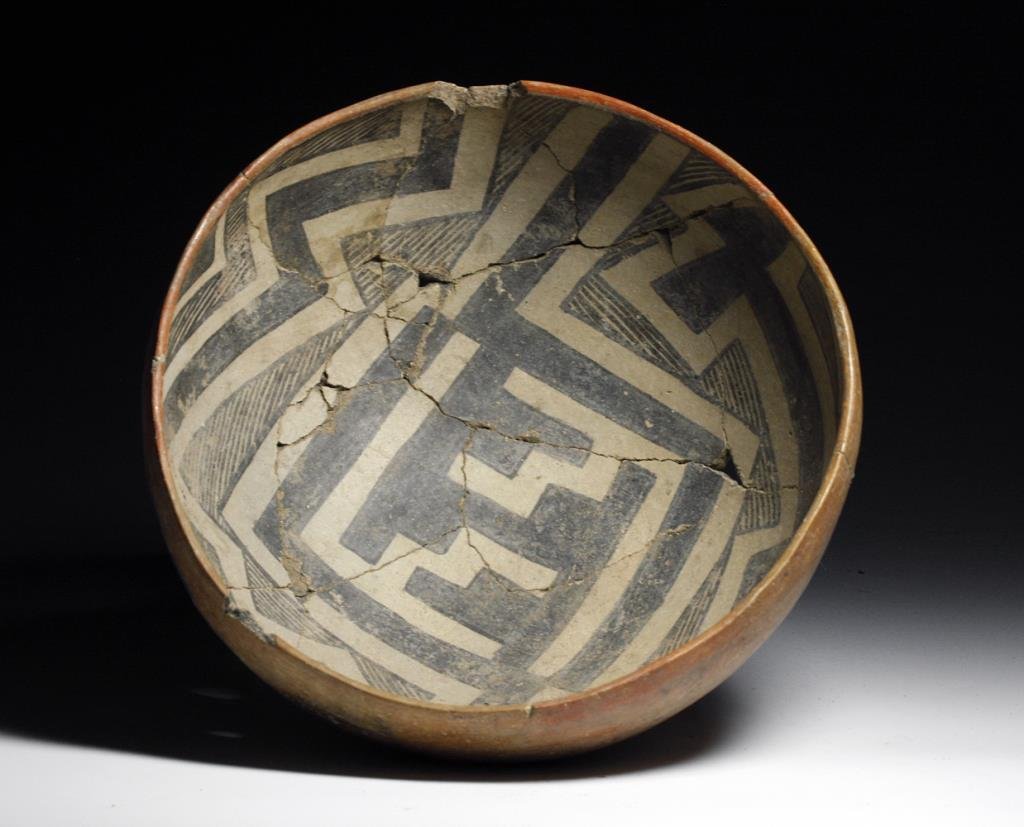 Very Large Native American Indian Anasazi Pinto Bowl: Starts at $150 Anasazi, Pinto polychrome, Ca 1200 - 1400 CE. A very attractive and large Pre-Historic Indian bowl, exterior in red slip, interior with repeating geometric patterns of black on white. 1