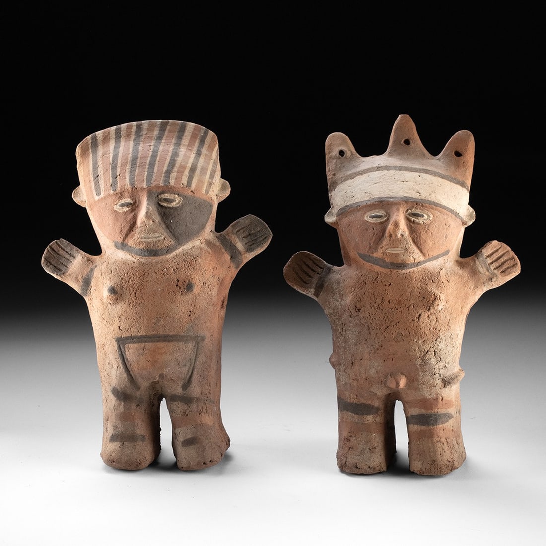 Chancay Cuchimilco Guardian Figures, Male and Female: Pre-Columbian, Peru, Chancay, ca. 1000–1470 CE. A pair of hollow terracotta cuchimilco figures, one male, one female, each shown nude with delineated nipples and genitalia, and flattened torsos 