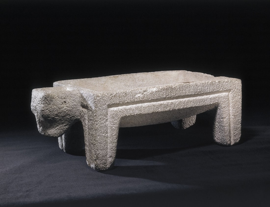 Ancient Near Eastern Basalt Bull Altar, Teshub: Ancient Near East, Eastern Anatolia, ca. 1600–1200 BCE. Basalt domestic altar in the form of a bull, whole and well preserved, with a pockmarked surface and the tip of the right back foot broken; ta