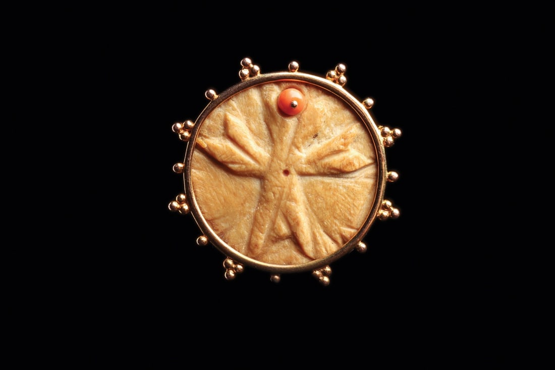 Byzantine Carved Bone Winged Figure Disc in Gold Brooch Mount with Coral Bead (1 of 4)