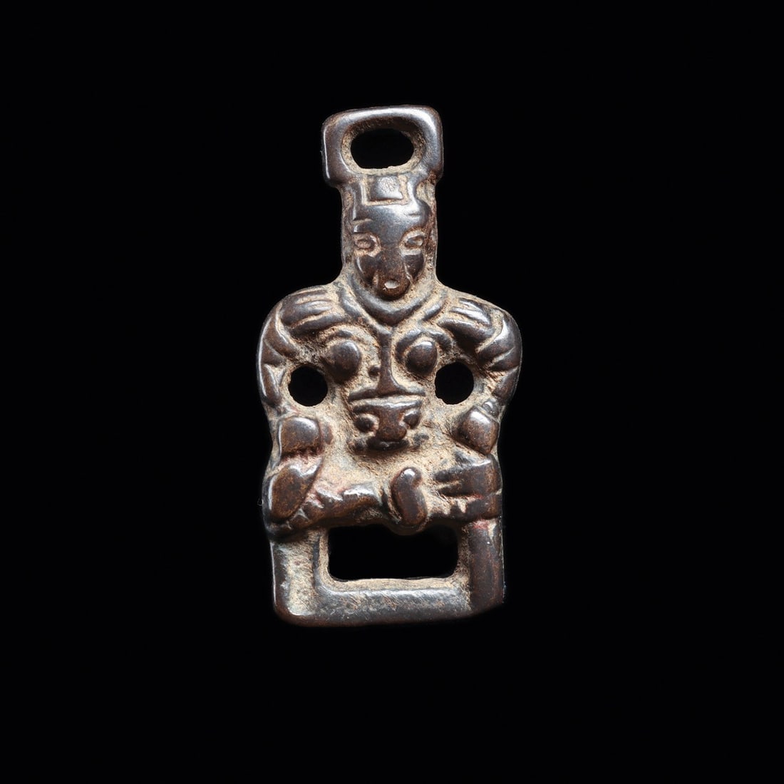 Viking Harness Fitting with Anthropomorphic Warrior Figure, 11th-14th C.: Northern Europe, Scandinavia, Viking culture, ca. 1000–1400 CE. A cast copper-alloy strap fitting shrunk to the size of a thumb, its plate modeled as a frontal human figure with a broad squared 