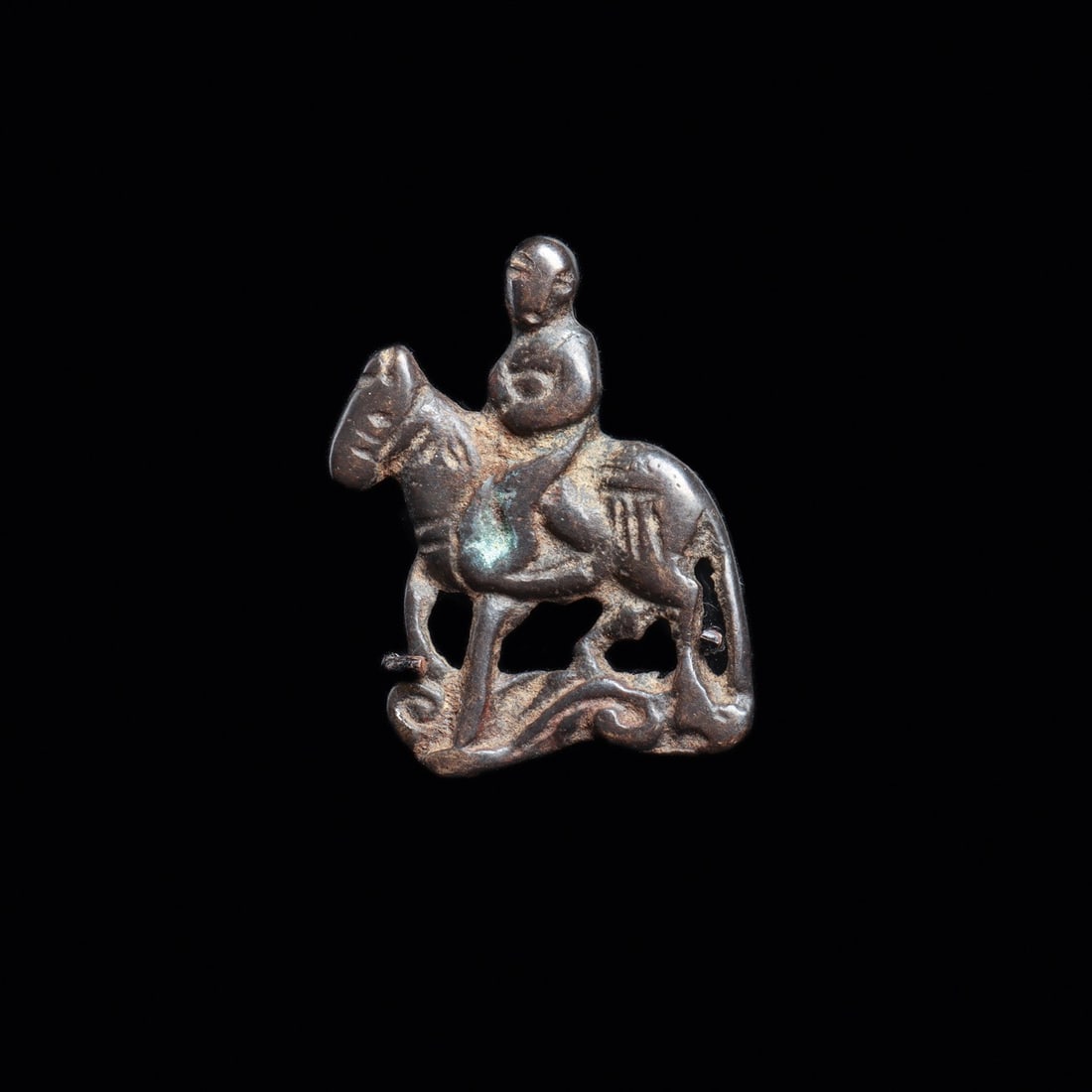 Viking Horse and Rider Appliqué Plaque, Ca. 1000-1400 CE: Northern Europe, Scandinavia, Viking culture, ca. 1000–1400 CE. A miniature cast openwork appliqué in the form of a horse and rider in profile, the sturdy pony striding forward with head lo