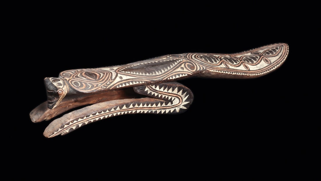 Sepik River Praying Mantis Bush Spirit Figure, Papua New Guinea: Oceania, Papua New Guinea, Sepik River, ca. 1800–1950 CE. A praying mantis rendered as a bush spirit, poised upright with a long tapering body, a small crowned head, and forelegs curving forward