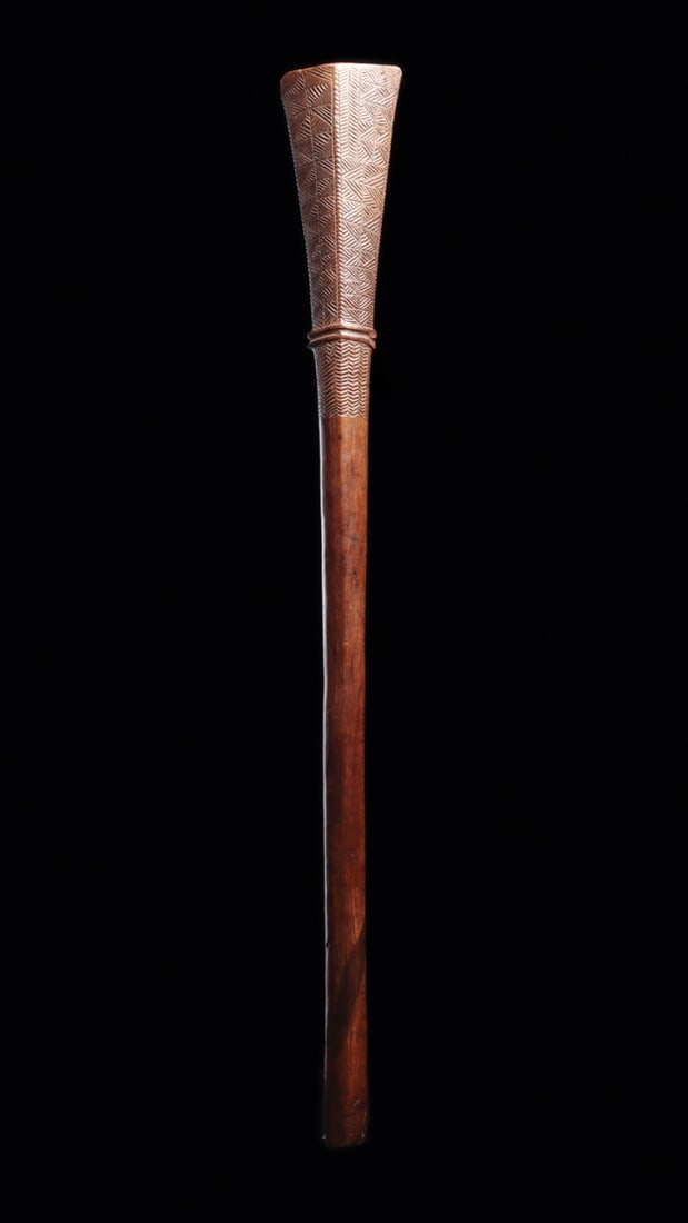 Tongan Apa'apai Club with Incised Geometric Panels, 18th C.: Polynesia, Tonga, ca. 1700–1799 CE. A two-handed hardwood war club of the type known as 'akau or apa'apai, its head flaring into a broad rhomboid blade with a gently curved striking edge. A doub