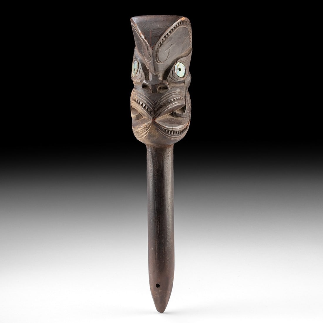 Maori God Stick (Whakapakoko Rākau), New Zealand, pre-1950: Oceania, New Zealand, Maori culture, ca. 1850–1950 CE. A Maori god stick, or whakapakoko rākau (taura atua), a wooden peg surmounted by a carved human head and tapering to a point below. Th