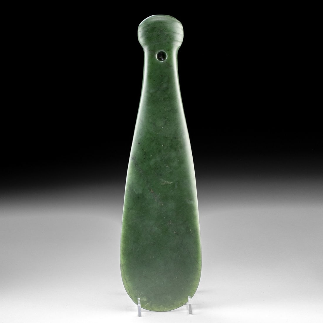 19th C. Maori Mere Pounamu, Chiefly Weapon (15.25"L): New Zealand, Maori, ca. 1800–1899 CE. A spatulate hand club ground and polished from a single block of translucent green pounamu, its broad blade tapering to a rounded striking edge and swelling