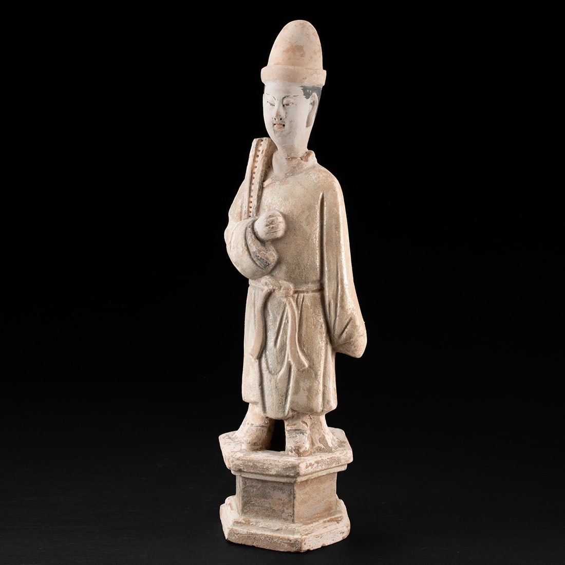Ming Dynasty Chinese Tomb Attendant Figure - TL'd: East Asia, China, Ming Dynasty, ca. 1368–1644 CE. A mold-made terracotta attendant figure standing on a stepped hexagonal plinth, with traces of green, orange, white, black, and red mineral pigm