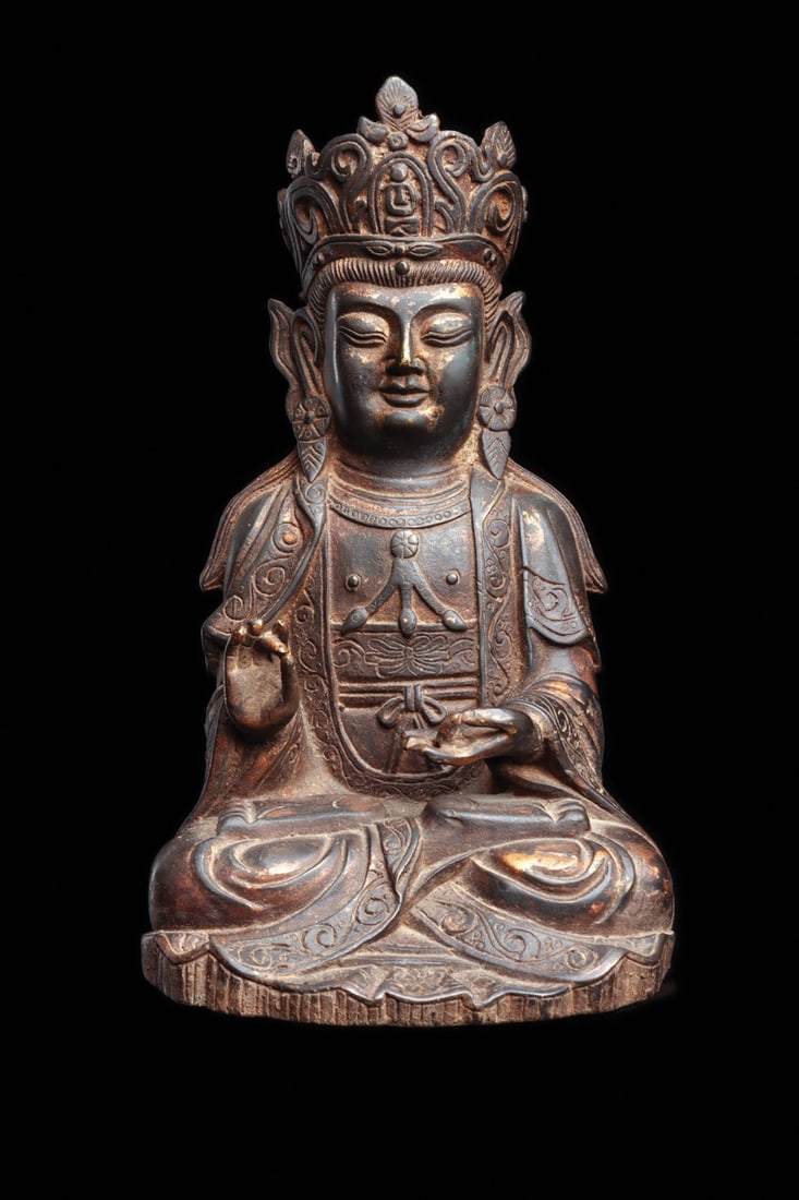 Ming Dynasty Seated Guanyin Bodhisattva with Amitabha Crown: East Asia, China, Ming Dynasty, ca. 1600–1700 CE. A crowned and bejeweled bodhisattva sits in dhyanasana, the right hand lifted in vitarka mudra while the left rests open in the lap. Hollow cast