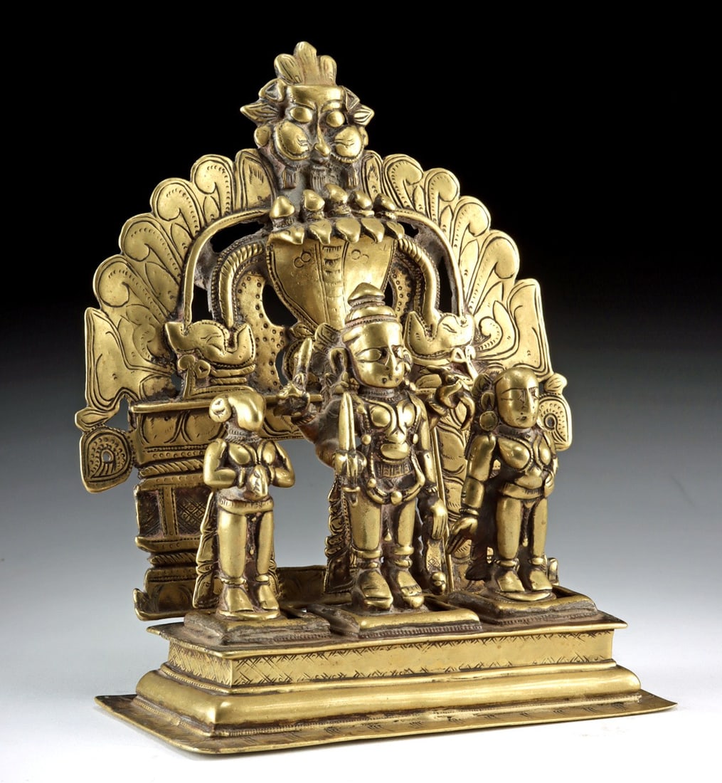 Indian Brass Shrine | Virabhadra with Daksha and Sati: Ca. 1700–1900 CE. South Asia, India, ca. 18th to 19th century CE. A five-piece freestanding brass shrine depicting Virabhadra, the fierce emanation of Shiva, flanked by Daksha and Sati. The cent