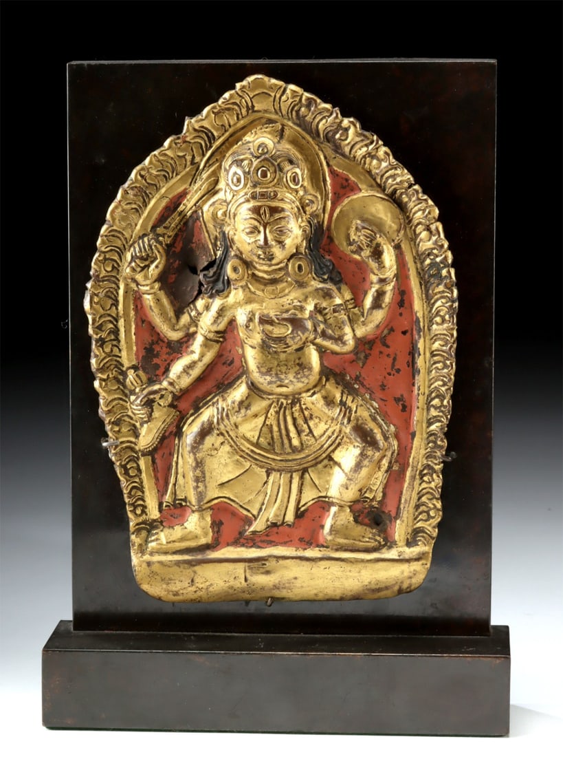 Tibetan Gilt Copper Repousse Plaque Vajravarahi (Dorje Phagmo): Tibet, ca. 1700–1899 CE. A gilt copper repoussé plaque depicting Vajravarahi (Dorje Phagmo), a tantric goddess regarded as the embodiment of wisdom and a principal female meditational deity