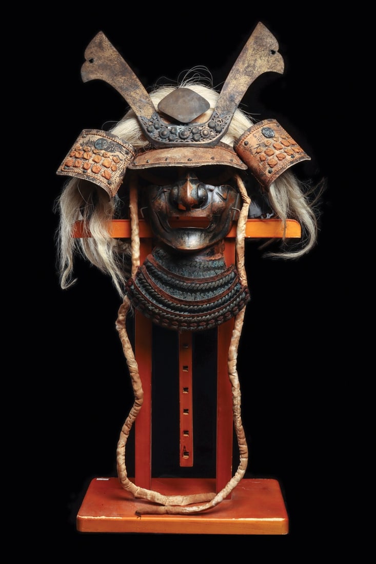 Edo Period Samurai Kabuto Helmet with Menpo Face Mask and Horsehair Wig: East Asia, Japan, Edo period, ca. 1700–1868 CE. A samurai head harness of theatrical presence, pairing a russet-iron kabuto with its lacquered iron menpo. The bowl carries a russet-iron crest ho